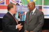 Ambassador Ron Kirk, United States Trade Representative, right, speaks with World Trade Week Chair William Collier, Keesal, Young & Logan, at the World Trade Week Kickoff Breakfast.